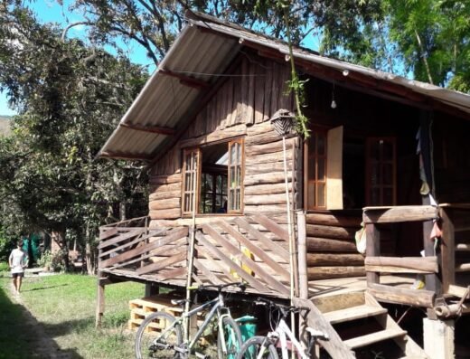 An old wooden house converted into a Youth Club in Vilcabamba